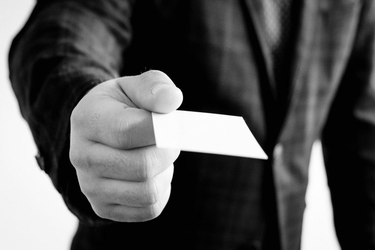Business card, hand, jacket — 5 Best Features to consider When Selecting an infant Tracking Application