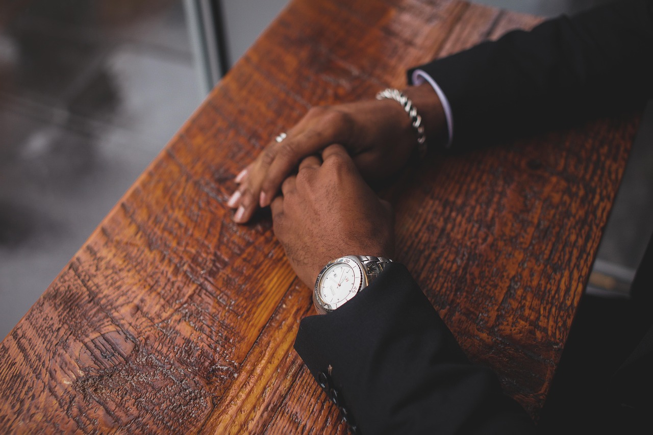 Business, hands, wristwatch — Bringing Spaces to Life: A Simple Guide to Modern LED Lighting