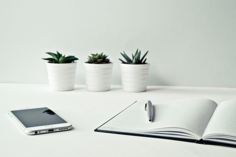 Desk, smartphone, iphone — Helpful Information Technology Training Courses