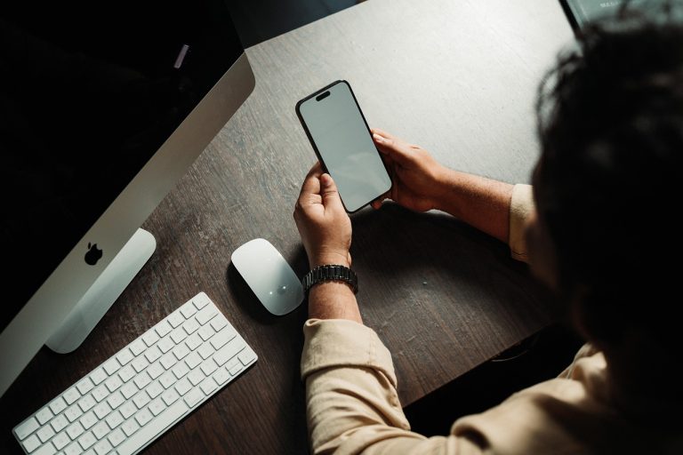 Man, smartphone, social media — Tips For Using WordPress SEO Plugins